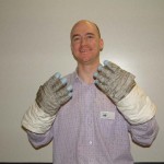 Me wearing Jim Lovell's gloves