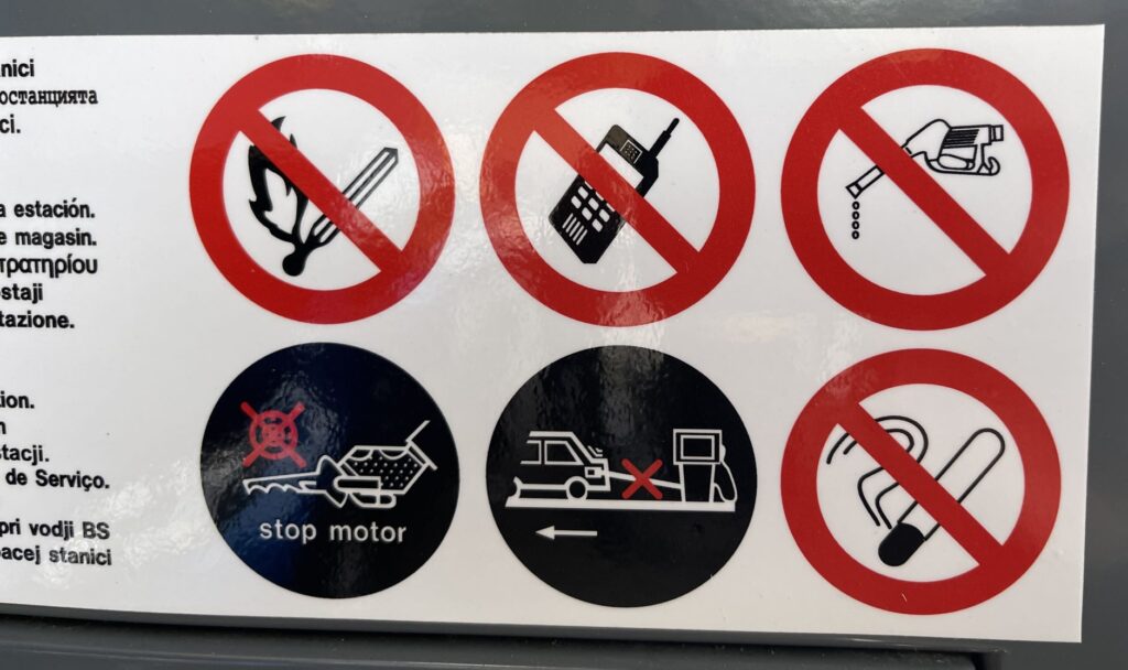 Warning Sign At Petrol Station