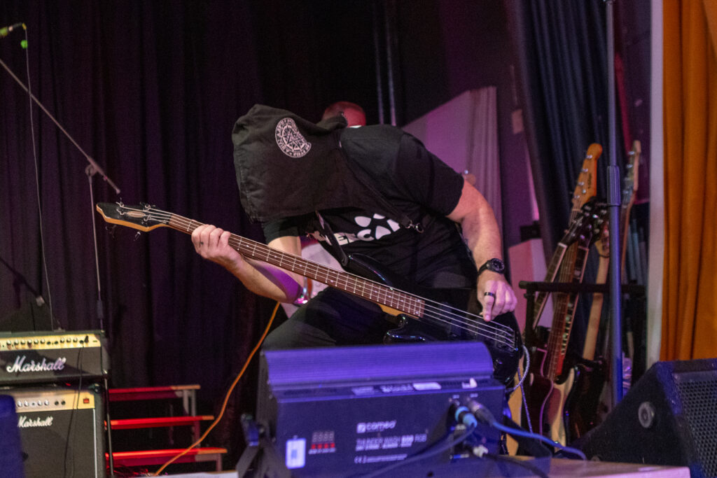 Some bassist at a school show